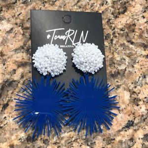 Team RLN blue and white Pom Pom